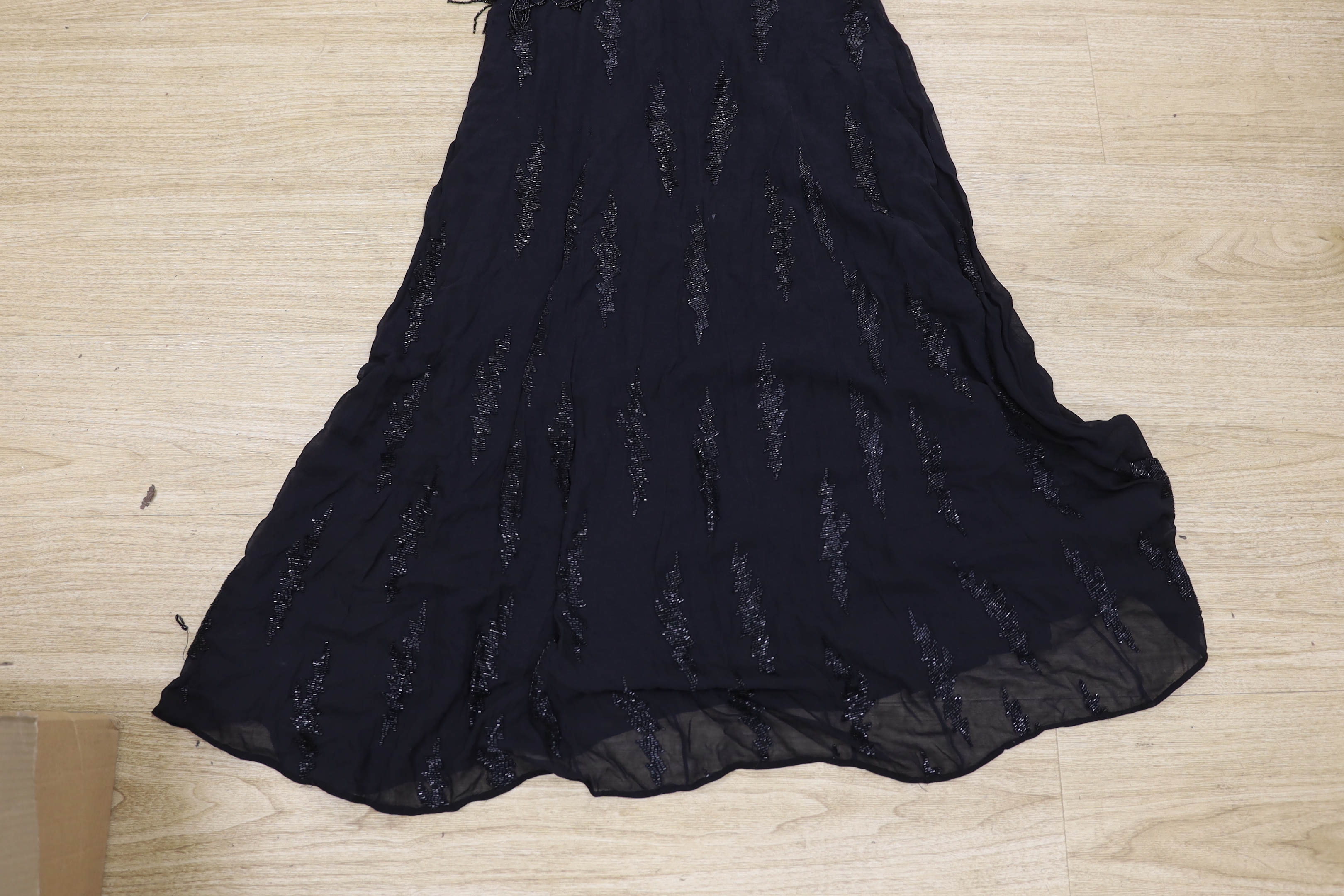 A 1930's black beaded evening dress